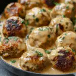 Homemade Cheesy Meatballs Paired with a Rich Creamy Onion Sauce