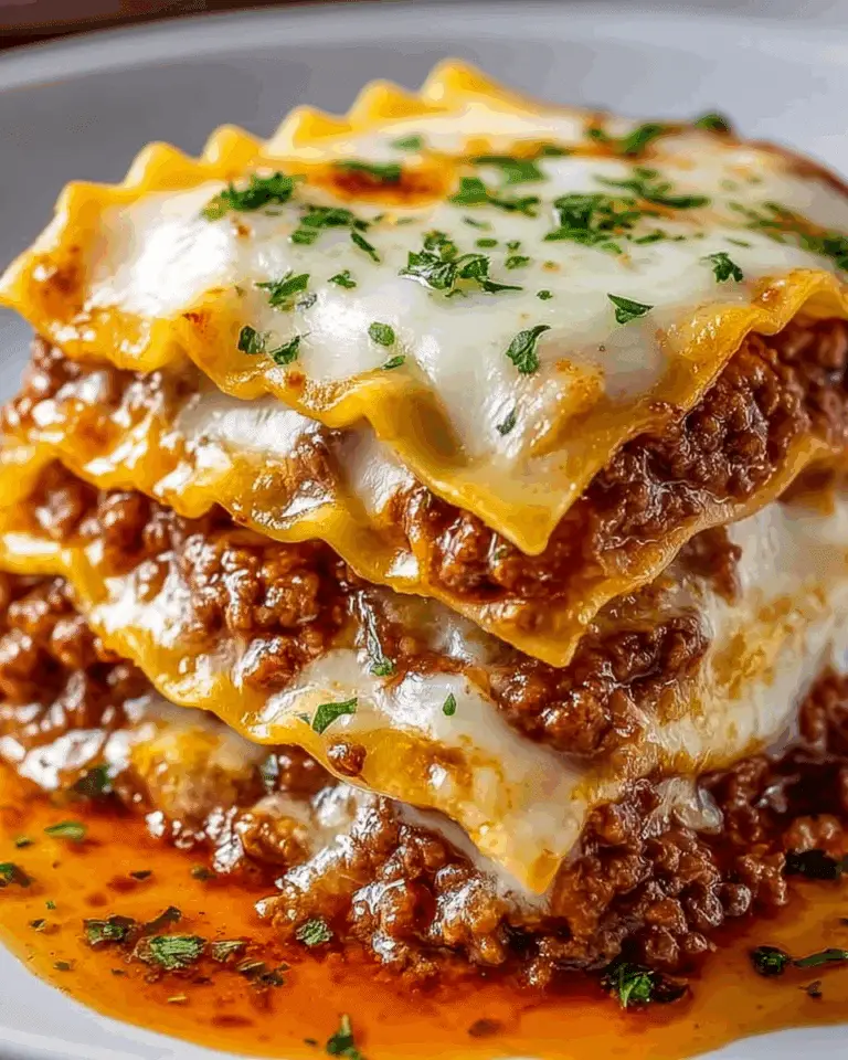 Baked Million Dollar Ravioli Casserole with Layers of Cheese and Meat Sauce